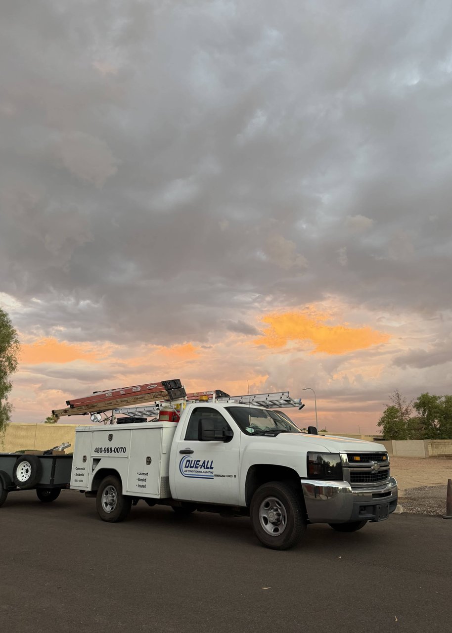 HVAC technician servicing system in Easy Valley AZ