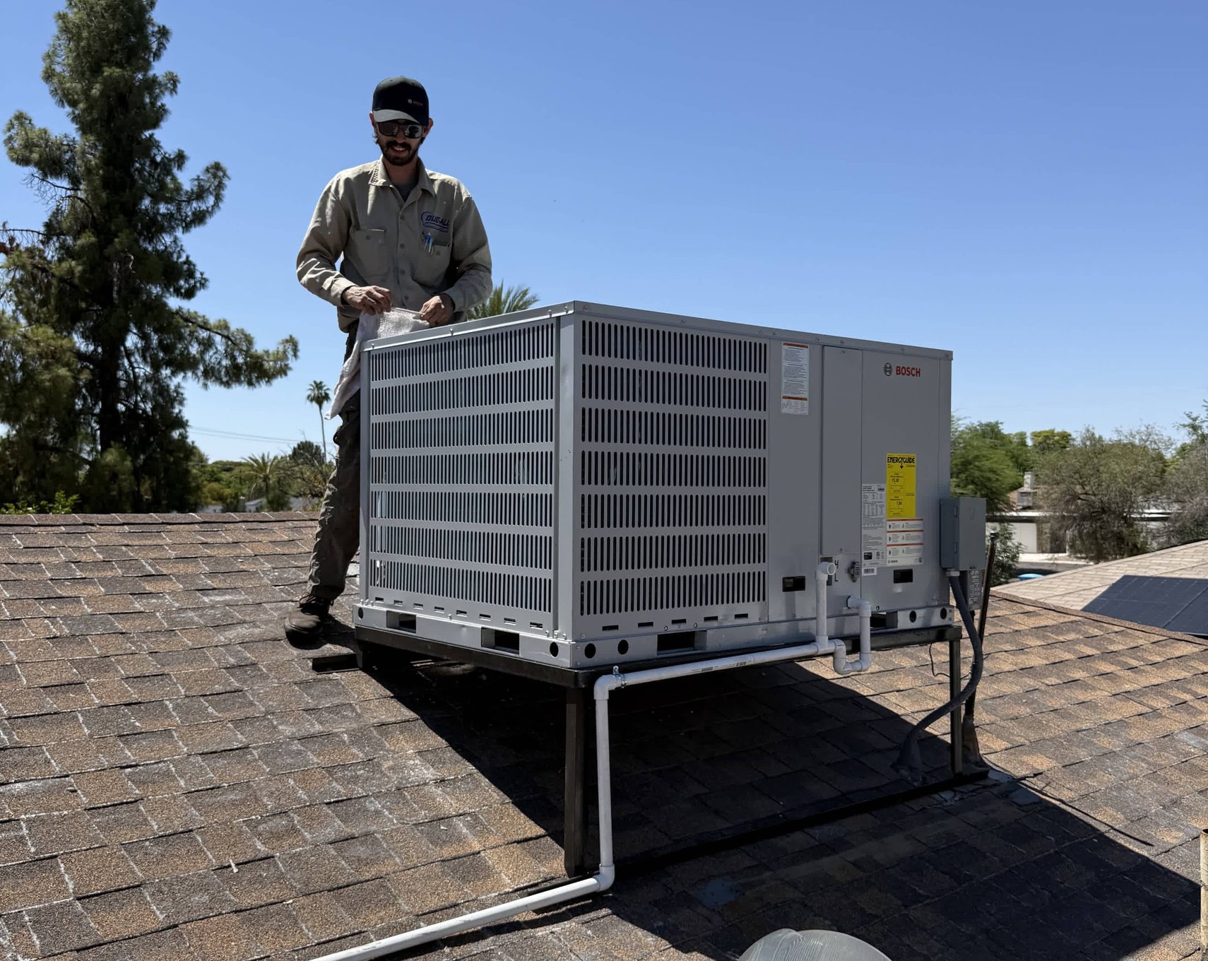 HVAC team inspecting indoor unit in Easy Valley AZ